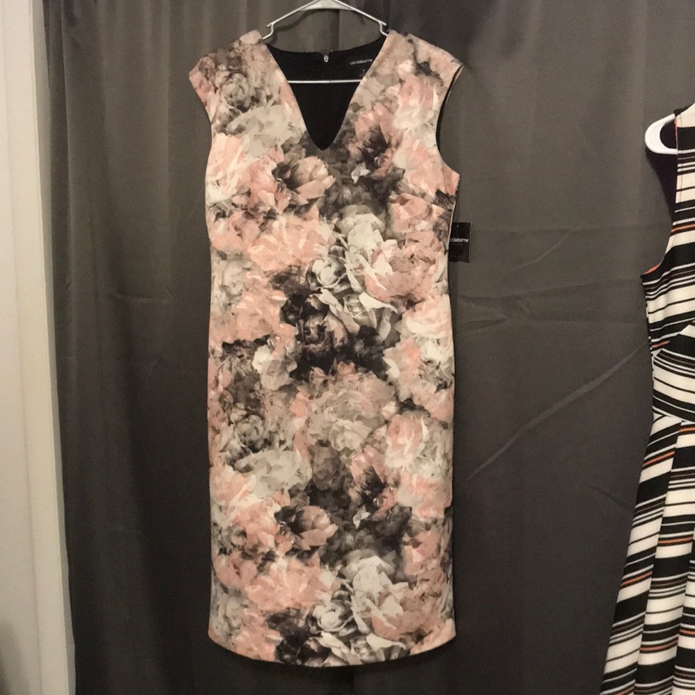 Obscure rose patterned dress.